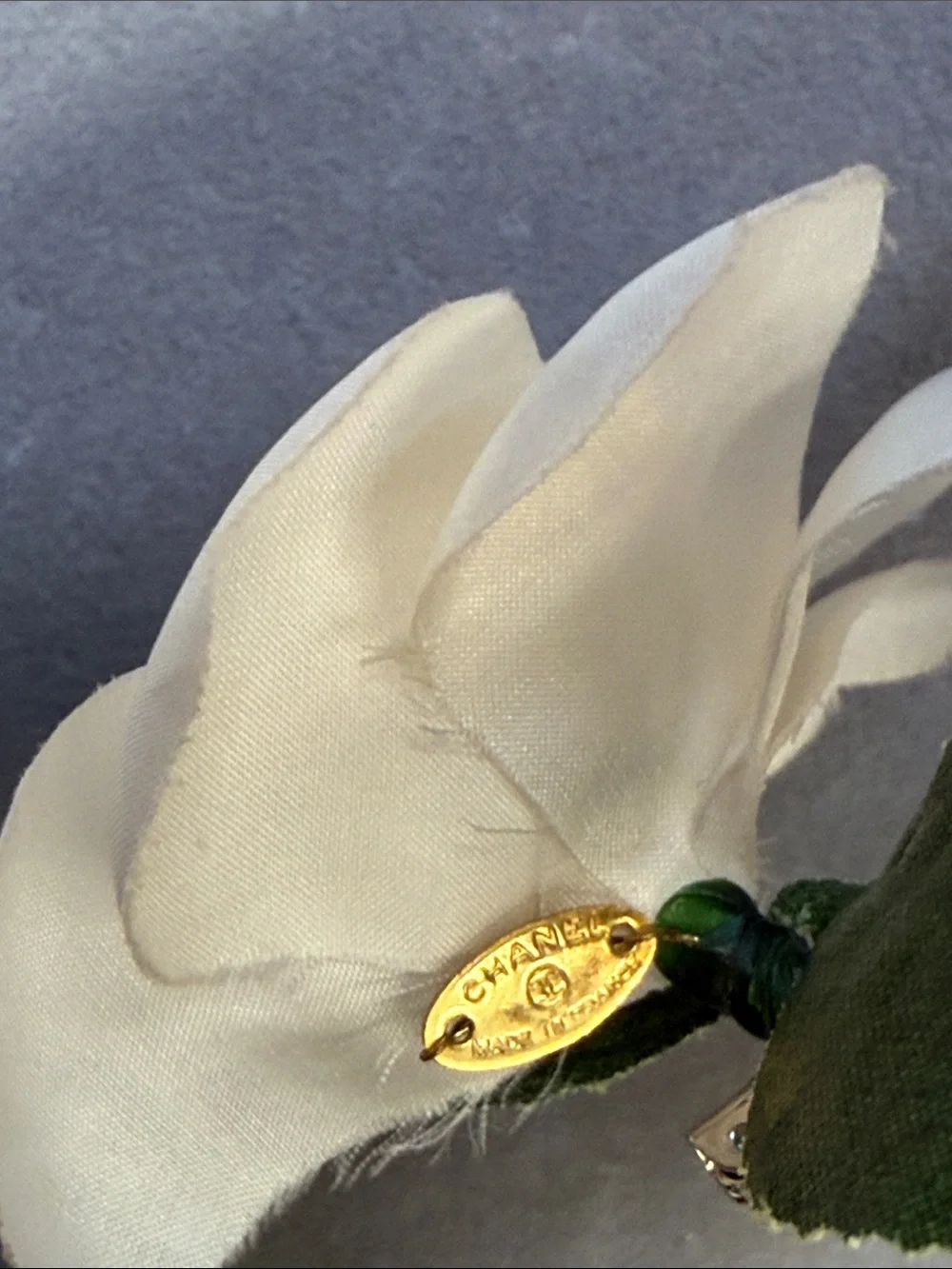 CHANEL Cream Camellia Pin with Yellow Center and Green Leaves